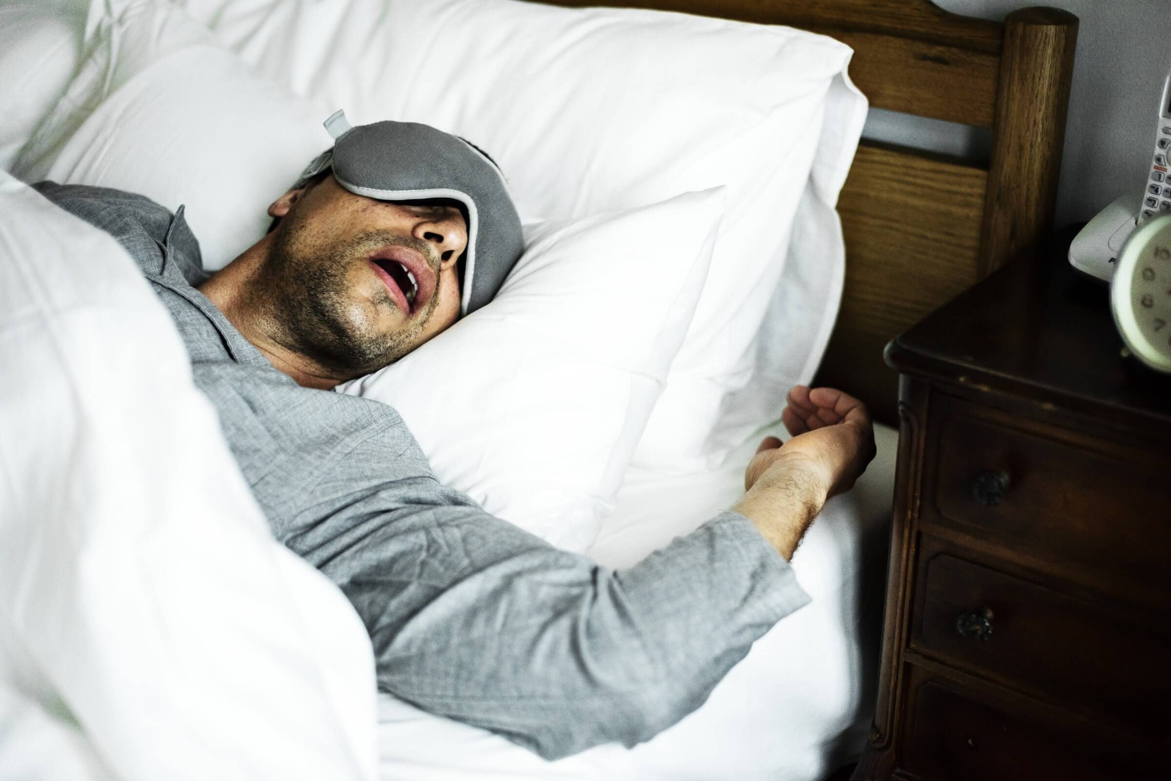 man snoring sleep apnea